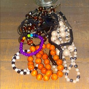 Colorful Beaded Necklaces and 2 Bracelets and ring in a pint jar. Mostly vintage